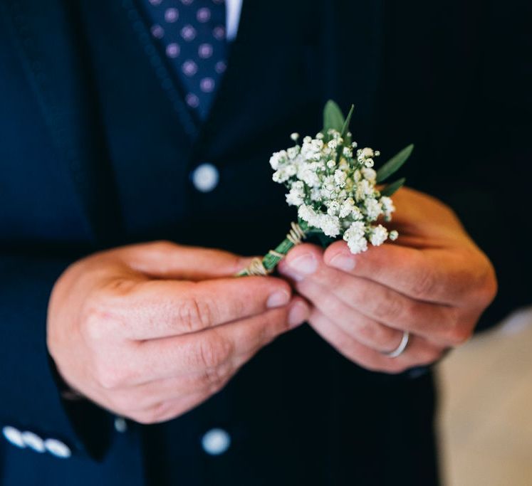 Gypsophila Buttonhole | Puglian Countryside Wedding with Fairy Light Altar and Olive Grove Aperitivo | Figtree Wedding Photography