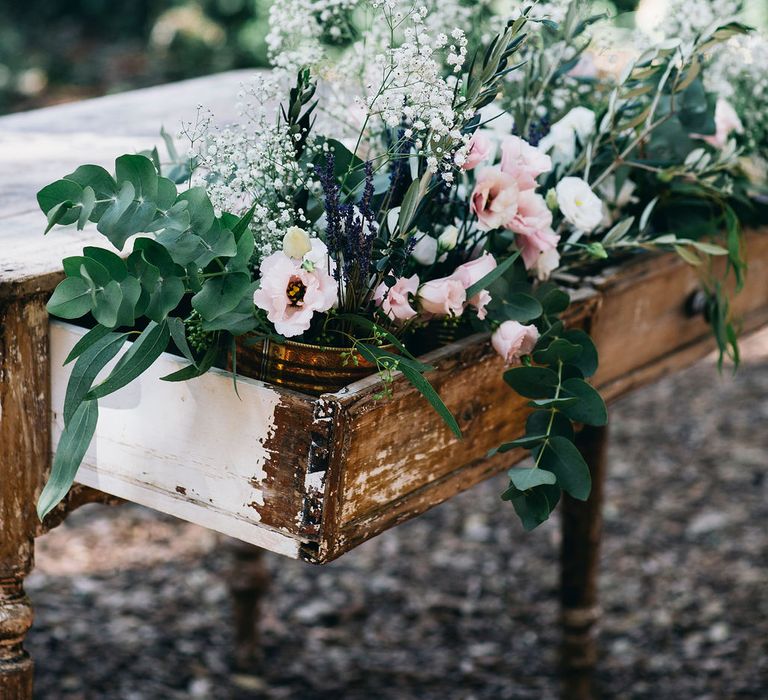 Outdoor Wedding Ceremony Decor | Registry Table Decorated with Huge Floral Display of Pink Flowers, White Flowers and Greenery | Puglian Countryside Wedding with Fairy Light Altar and Olive Grove Aperitivo | Figtree Wedding Photography