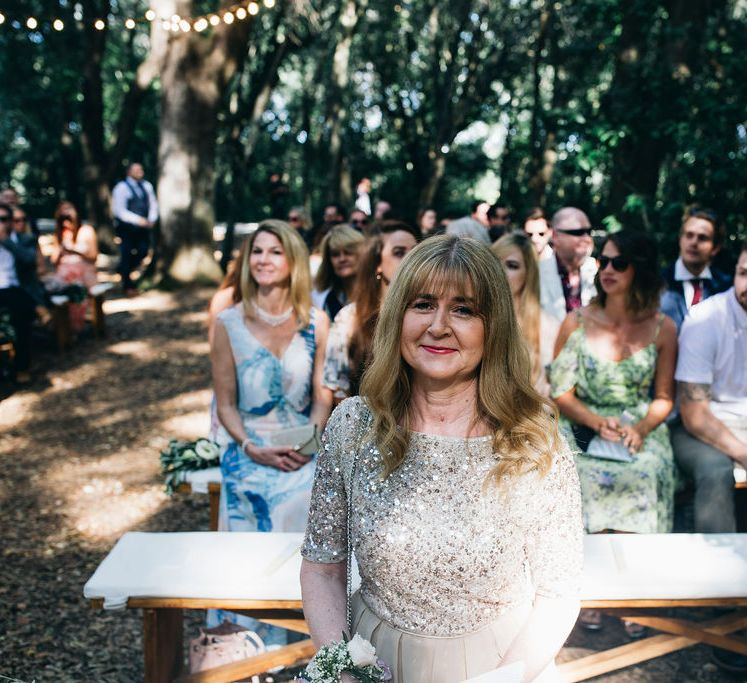 Mother of the Bride in Taupe Adrianna Papell Dress with Sparkly Bodice and Soft Skirt | Puglian Countryside Wedding with Fairy Light Altar and Olive Grove Aperitivo | Figtree Wedding Photography