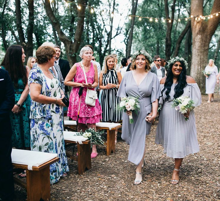 Bridesmaids in Mismatched Lilac Dresses | Bouquets of White, Soft Pink, Purple and Yellow Flowers with Greenery | Flower Crowns | Festoon Lights | Puglian Countryside Wedding with Fairy Light Altar and Olive Grove Aperitivo | Figtree Wedding Photography