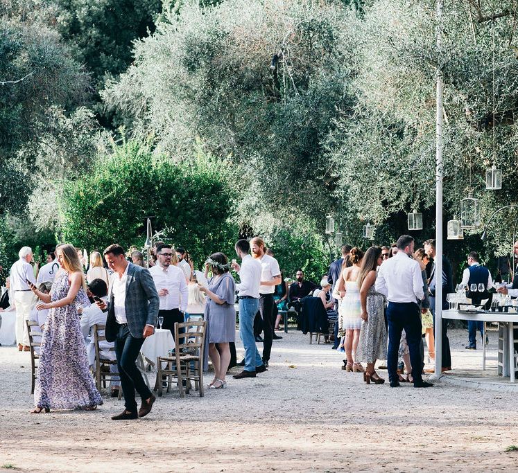 Aperitivo Hour in the Olive Grove at Tenuta Tresca | Puglian Countryside Wedding with Fairy Light Altar and Olive Grove Aperitivo | Figtree Wedding Photography