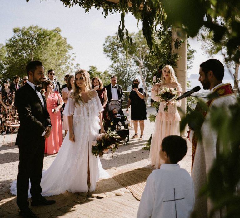 Bride and Groom During Their Outdoor Wedding Ceremony