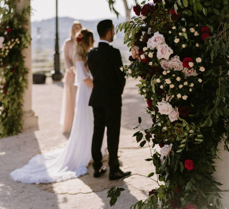 Bride and Groom Standing at The Altar During Their Wedding Ceremony