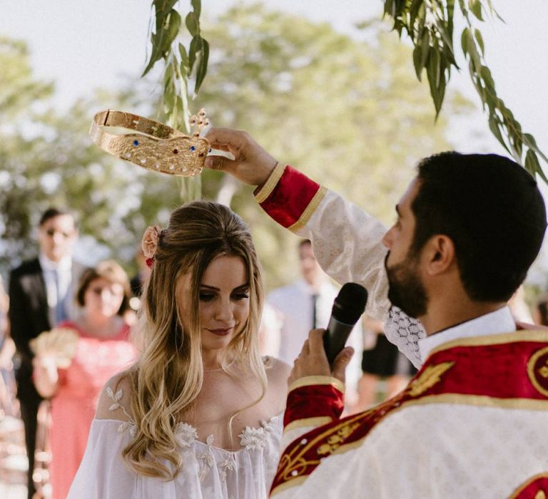 Bride Being Bless with a Crown During The Orthodox Wedding Ceremony