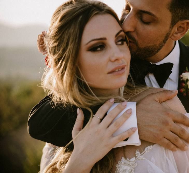 Groom Kissing His Brides Head