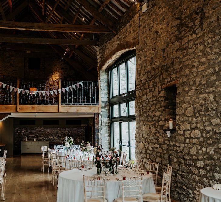 Priston Mill, barn wedding reception decor with bunting