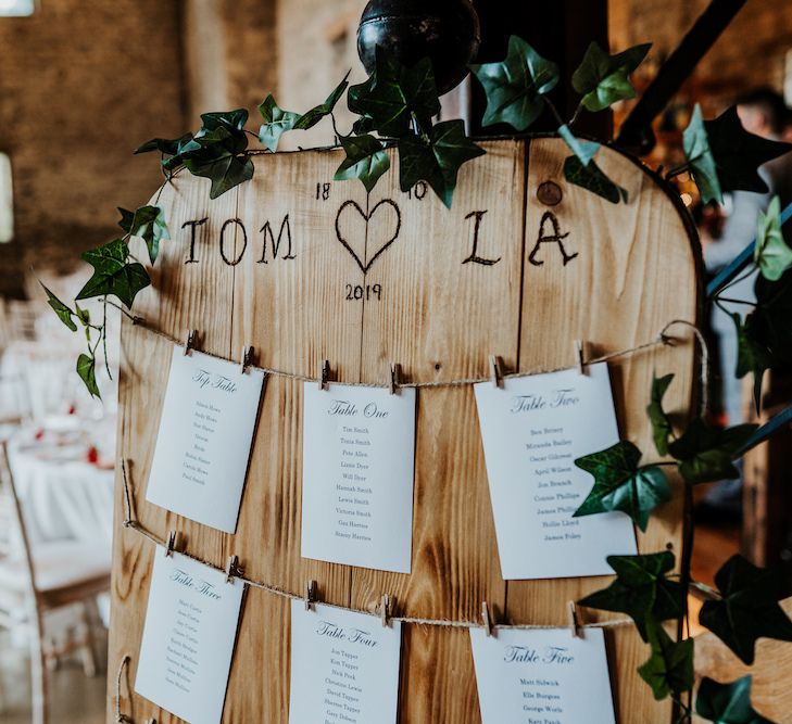 Engraved wooden table plan at Priston Mill