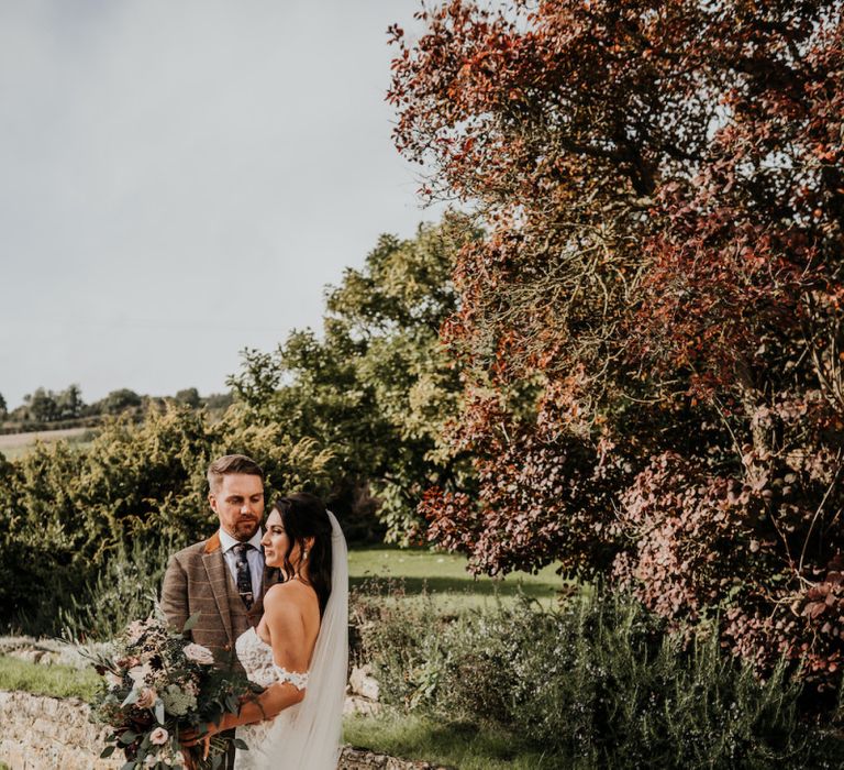 Bride and groom portrait at Priston Mill