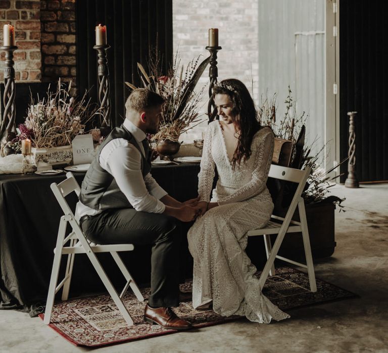 Boho Bride and Groom Sitting at Rustic TableScape in The Engine Works Glasgow