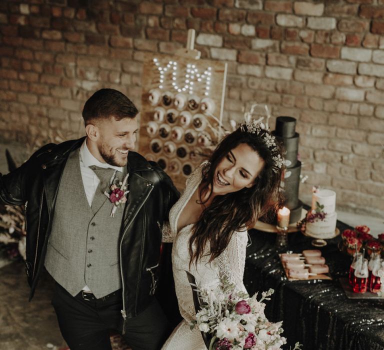 Boho Bride and Groom Dancing on Persian Rugs