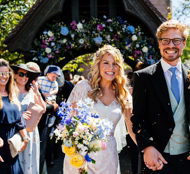 Confetti Moment with Bride in Lace Essence of Australia Wedding Dress and Groom in Morning Suit