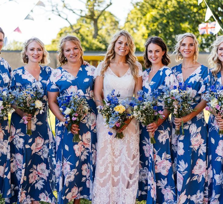 Bride in Essense of Australia Wedding Dress and Bridesmaids in Blue Floral Dresses from French Connection