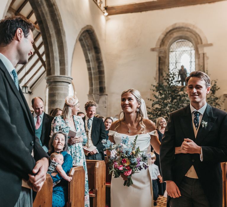 Church wedding ceremony bridal entrance in Halfpenny London wedding dress