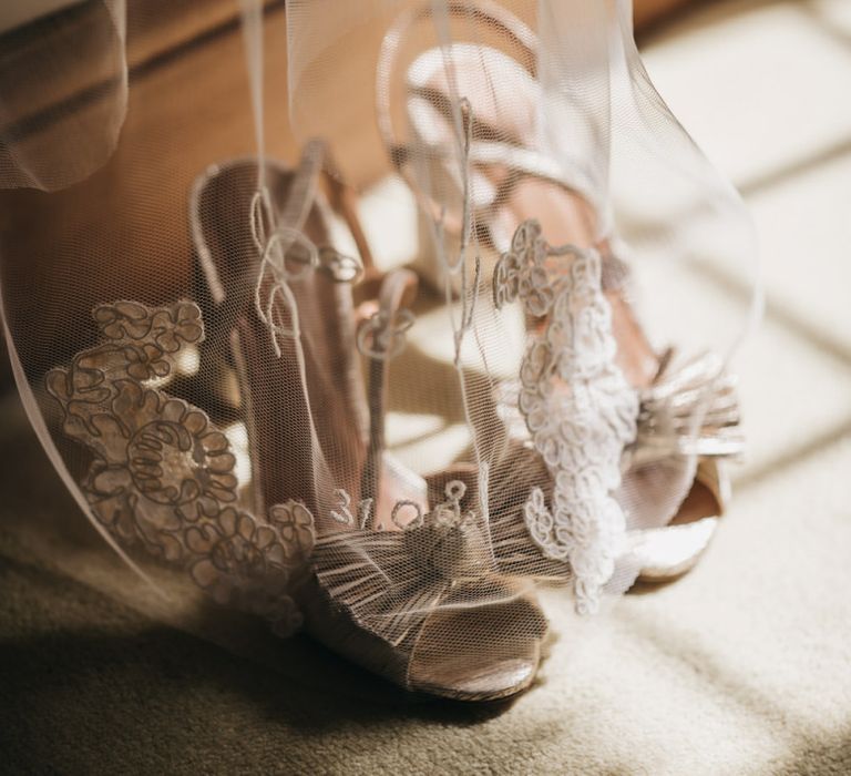 Sezane wedding shoes with bow front and lace edge wedding veil