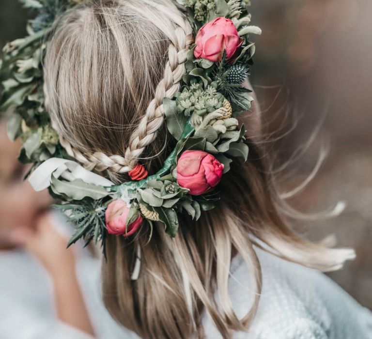 Flower girl with plated hair and peony flower crown