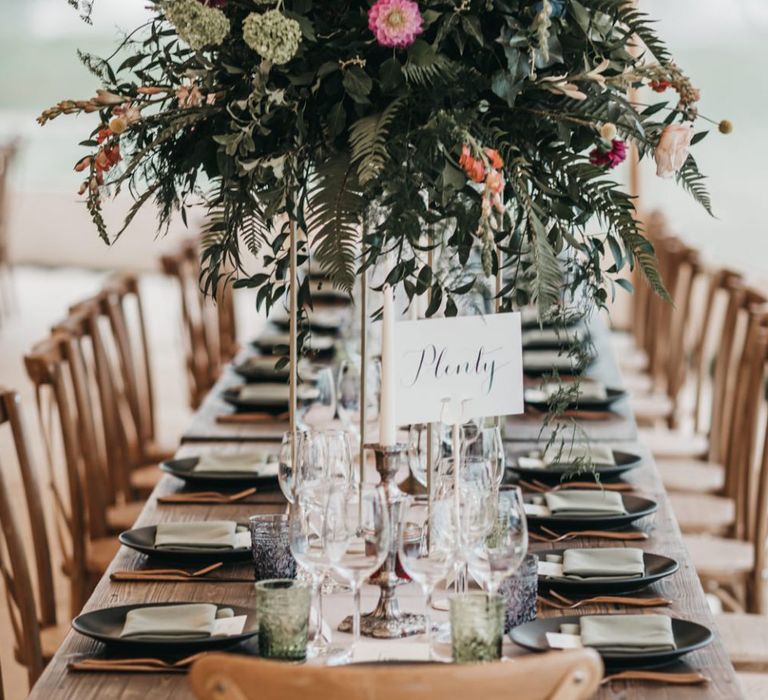 Calligraphy table name signs for Sperry tent reception and church wedding