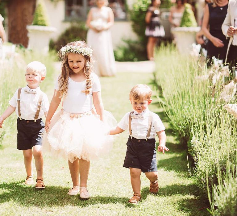 Page Boys and Flower Girl During Wedding Ceremony