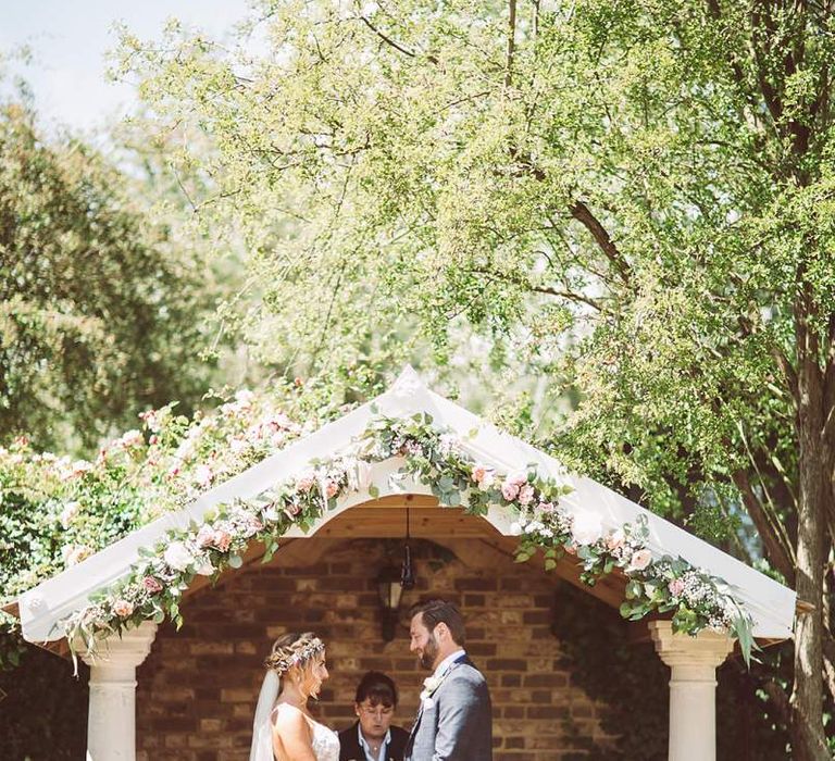 Bride and Groom Saying Their Vows During Wedding Ceremony