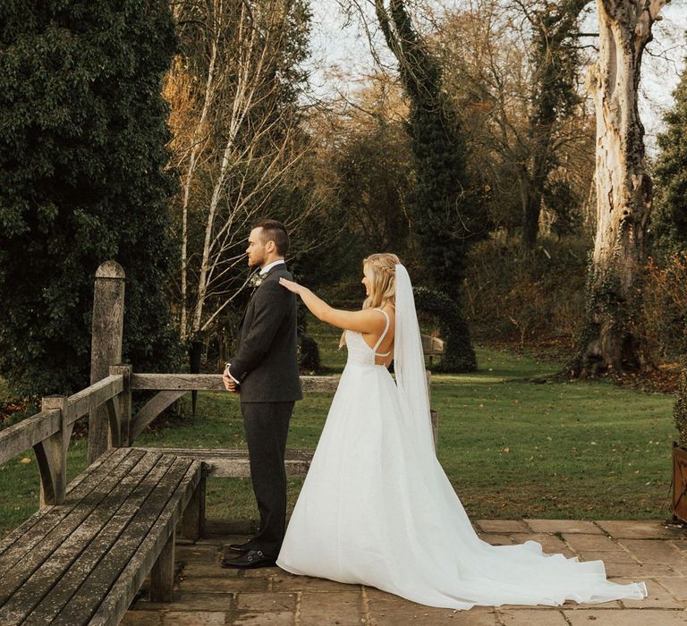 Bride and groom first look at November wedding