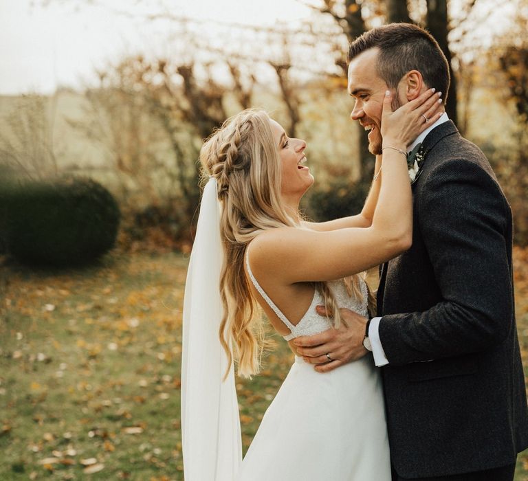 Boho bride with braided half up half down hair