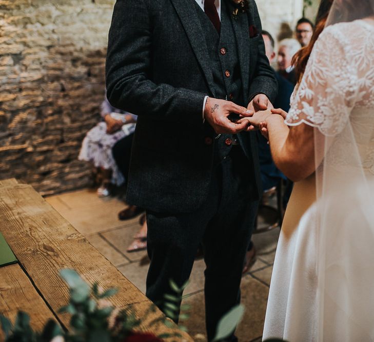 Bride and Groom tying the knot