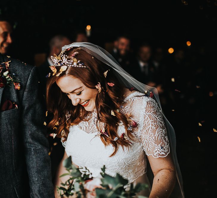 Bride wearing bridal crown and lace detail two-piece