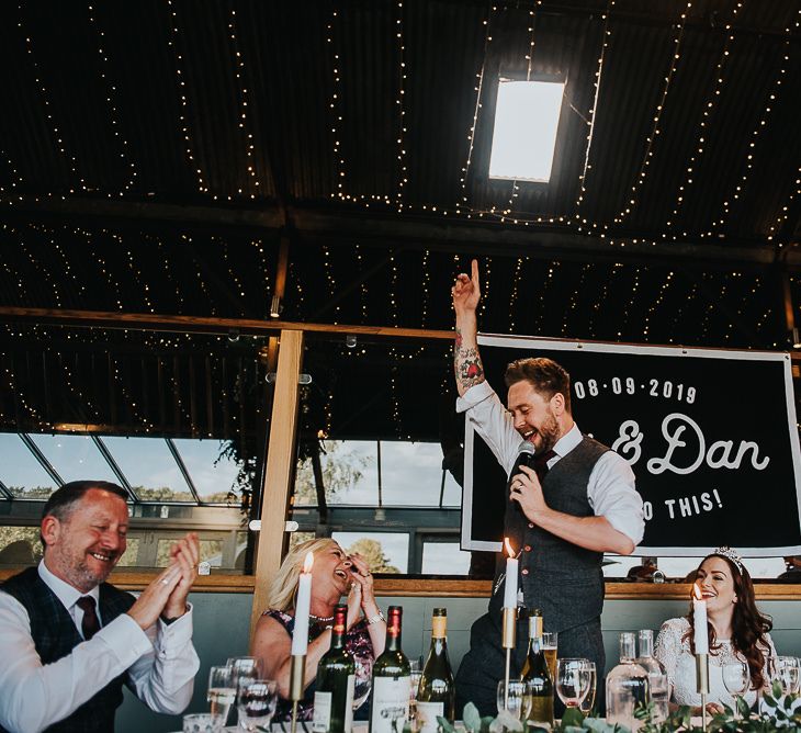 Groom wedding speech with light box sign