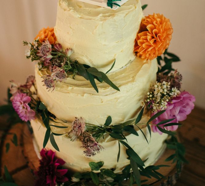 Buttercream Wedding Cake With Lego Bride &amp; Groom // Boho Pub Wedding At The Crooked Billet Stoke Row With Bride &amp; Bridesmaids In Flower Crowns And Vintage Fire Truck With Images From Ed Godden Photography