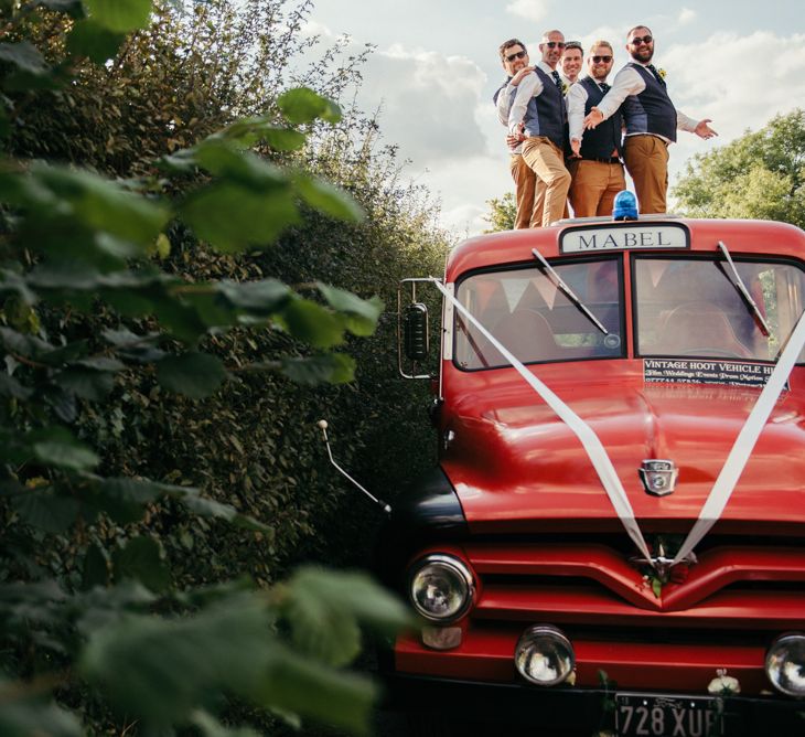 Vintage Fire Truck Wedding Transport // Boho Pub Wedding At The Crooked Billet Stoke Row With Bride &amp; Bridesmaids In Flower Crowns And Vintage Fire Truck With Images From Ed Godden Photography