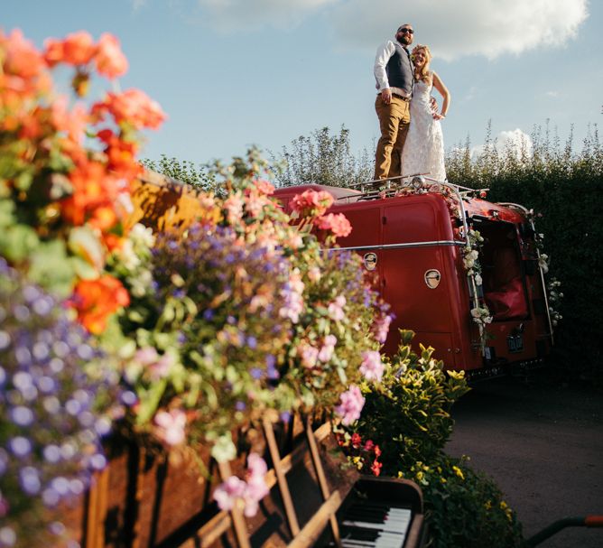 Vintage Fire Truck Wedding Transport // Boho Pub Wedding At The Crooked Billet Stoke Row With Bride &amp; Bridesmaids In Flower Crowns And Vintage Fire Truck With Images From Ed Godden Photography