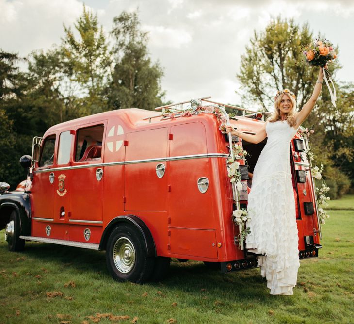 Vintage Fire Truck Wedding Transport // Boho Pub Wedding At The Crooked Billet Stoke Row With Bride &amp; Bridesmaids In Flower Crowns And Vintage Fire Truck With Images From Ed Godden Photography