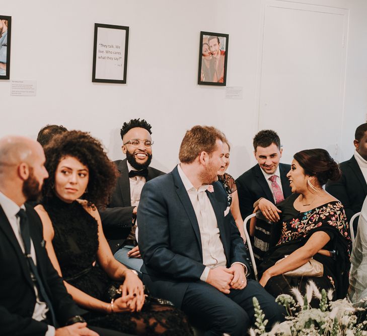 Wedding guests at intimate wedding ceremony