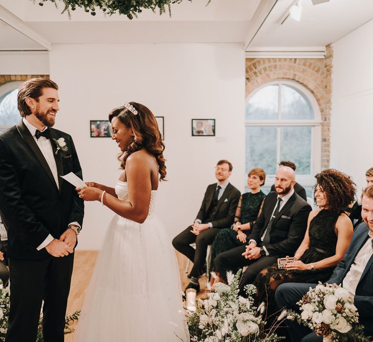 Bride reading her vows at Pump House Gallery wedding ceremony