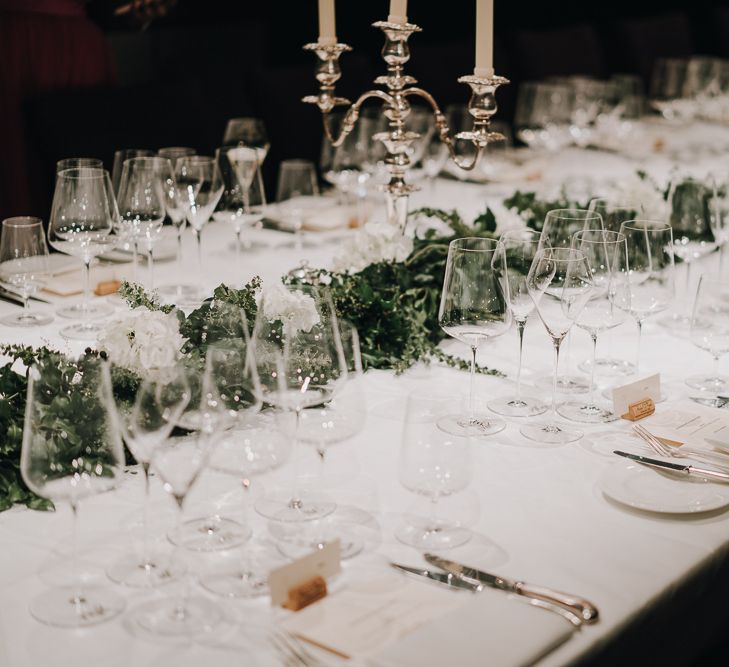 Elegant table setting with cork name place signs and candelabras