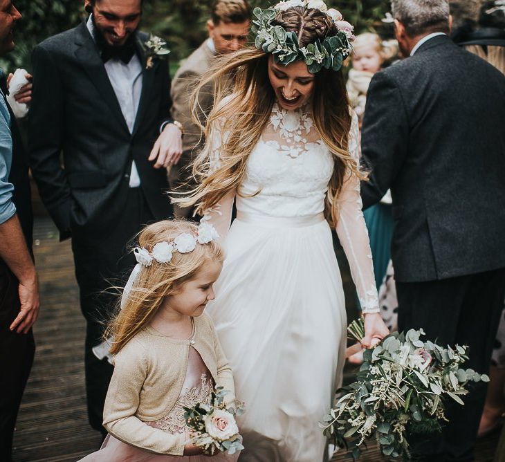 Bride in Catherine Deane Wedding Dress and Flower Girl in Monsoon Dress