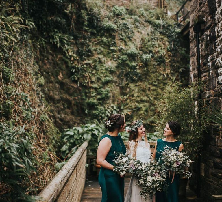 Bridal Party Portrait with Bridesmaids in Ghost Forest Green Dresses and Bride in Catherine Deane Separates