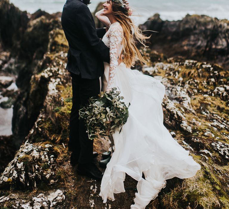 Coastal Portrait of Bride in Catherine Deane Separates and Flower Crown and Groom in Tuxedo