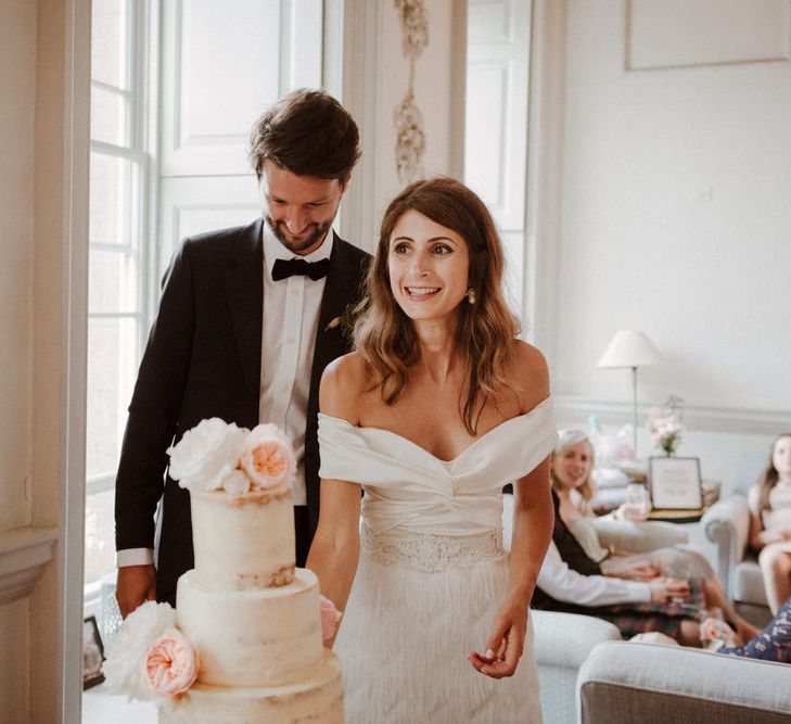 Cutting The Cake // Boconnoc Cornwall Weekend Wedding With Bride In Halfpenny London &amp; Groom In Paul Smith With Images From The Curries