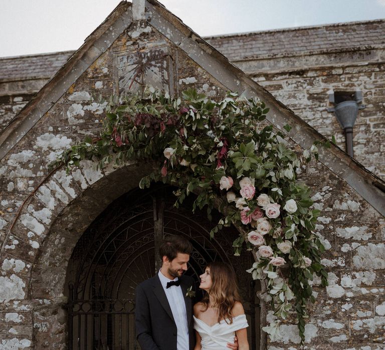 Floral Arch For Church // Boconnoc Cornwall Weekend Wedding With Bride In Halfpenny London &amp; Groom In Paul Smith With Images From The Curries