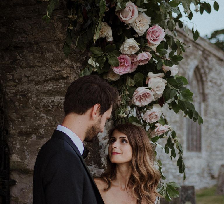 Floral Arch For Church // Boconnoc Cornwall Weekend Wedding With Bride In Halfpenny London &amp; Groom In Paul Smith With Images From The Curries