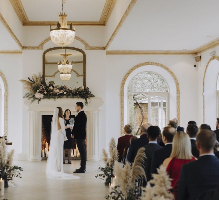 Wedding Ceremony at north brook Park with Pampas Grass Aisle Flowers