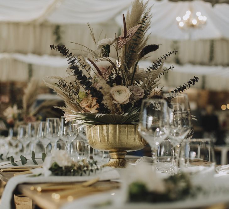 Wedding Flower Arrangement in Gold Vessel with Pampas Grass, Feathers, Muted Roses and Foliage