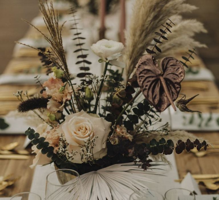 Wedding Flower Centrepiece in Gold Vessel with Pampas Grass, Feathers, Muted Roses and Foliage