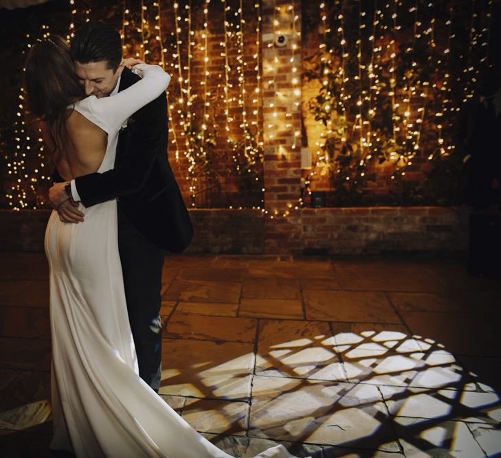 First Dance with Bride in Backless Emma Beaumont Wedding Dress and Groom in Tuxedo