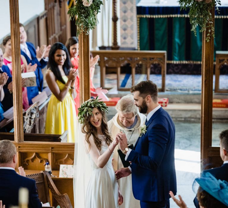 Church Wedding Ceremony with Bride and Groom at the Altar