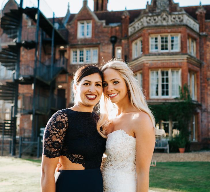 Bride and Wedding Guest in Navy Dress