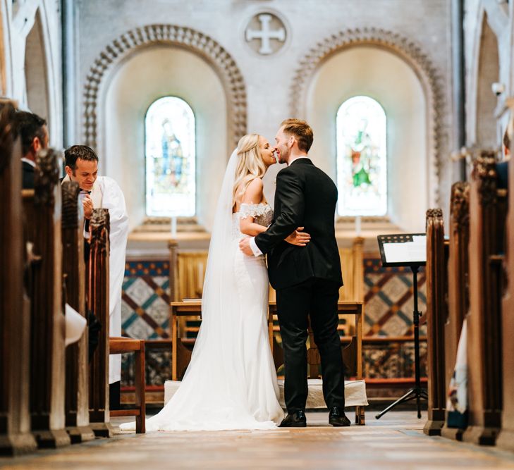 Bride and Groom at the Church Altar