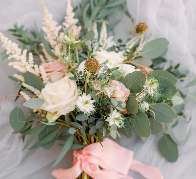 Beautiful bouquet for bride with pink ribbon