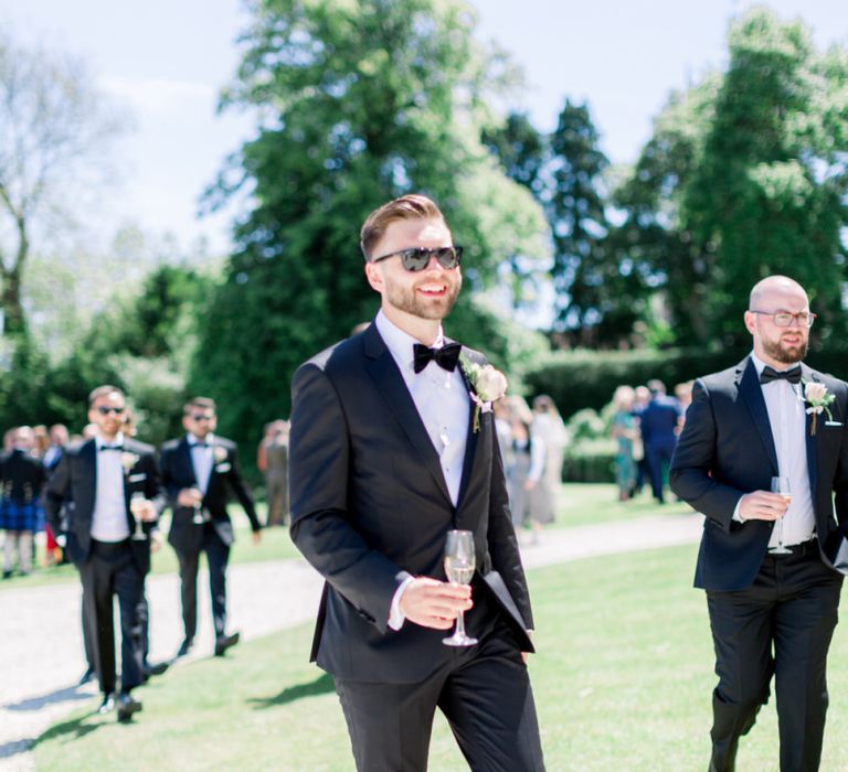 Groom in classic black tuxedo