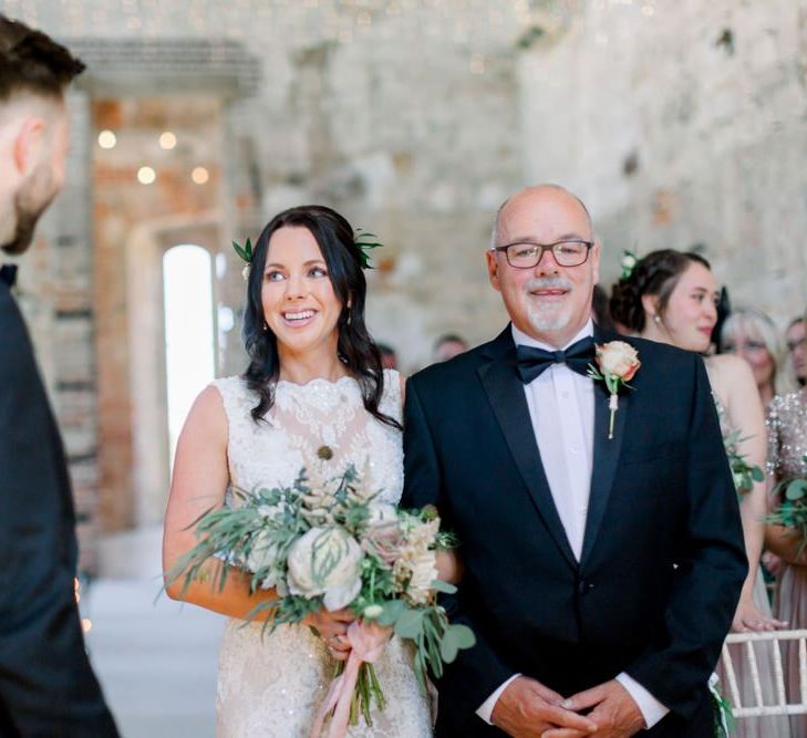 Bride greets her husband-to-be at altar